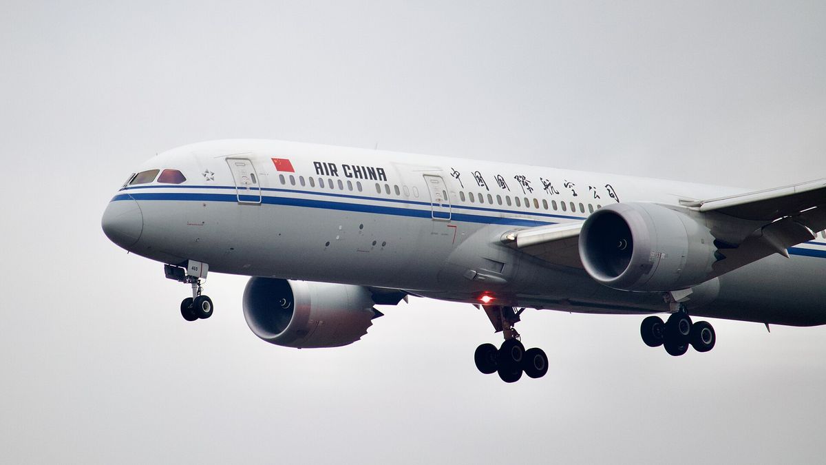 An Air China Boeing 787 with landing gear down on approach to Frankfurt Airport
