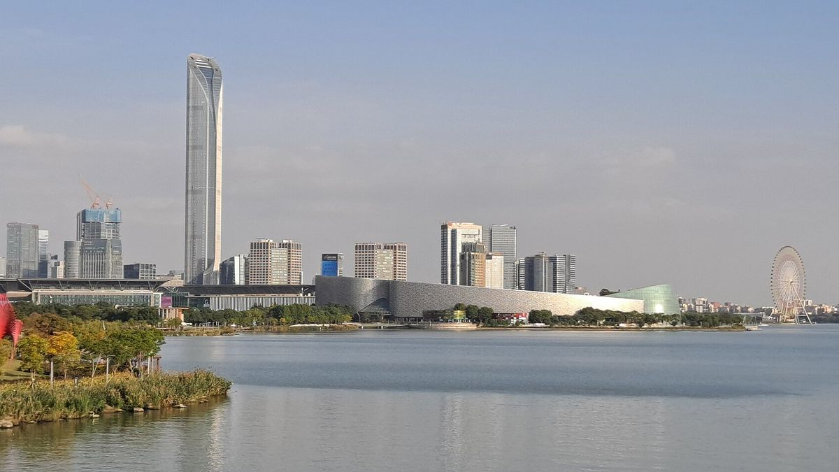 Office towers and factories of Suzhou Industrial Park across Jinji Lake in Jiangsu province