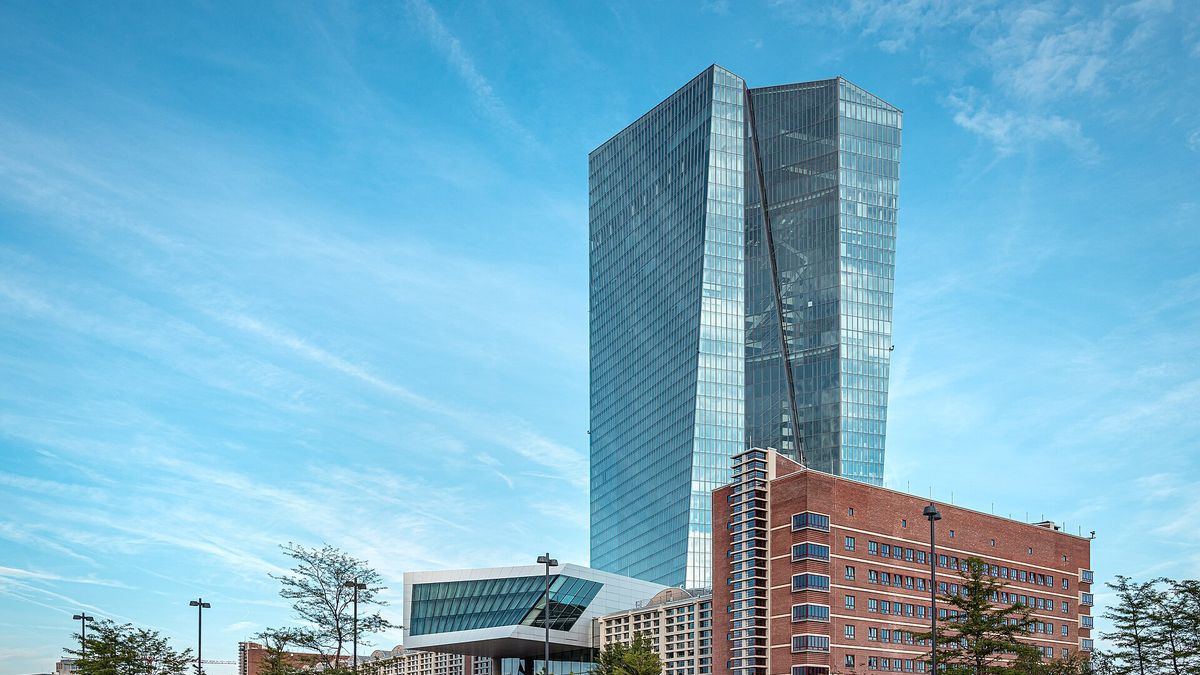 The glass towers of the European Central Bank headquarters in Frankfurt under a blue sky