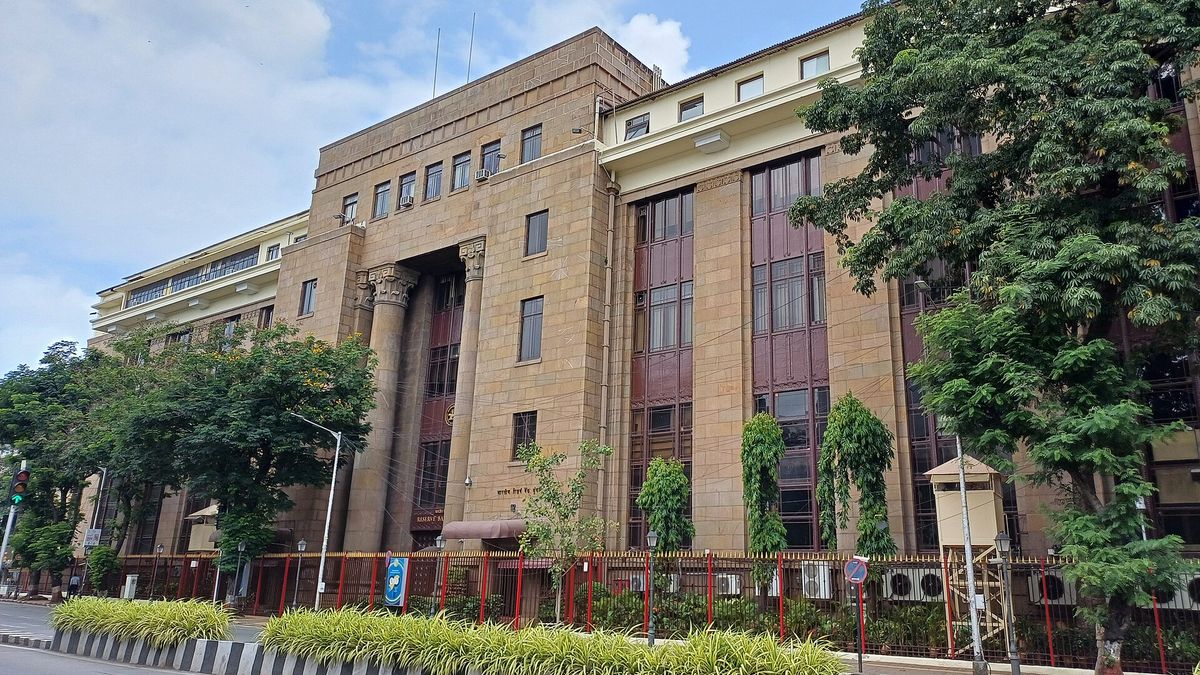 The Reserve Bank of India headquarters building on a street in Mumbai