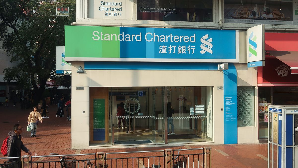A Standard Chartered bank branch on a shopping street in Yuen Long, Hong Kong